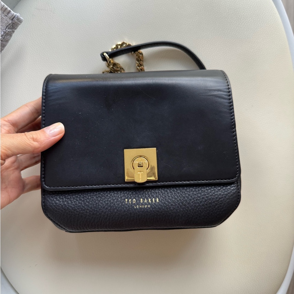 Ted Baker Black and Gold Crossbody Bag with Sleek Design genuine leather